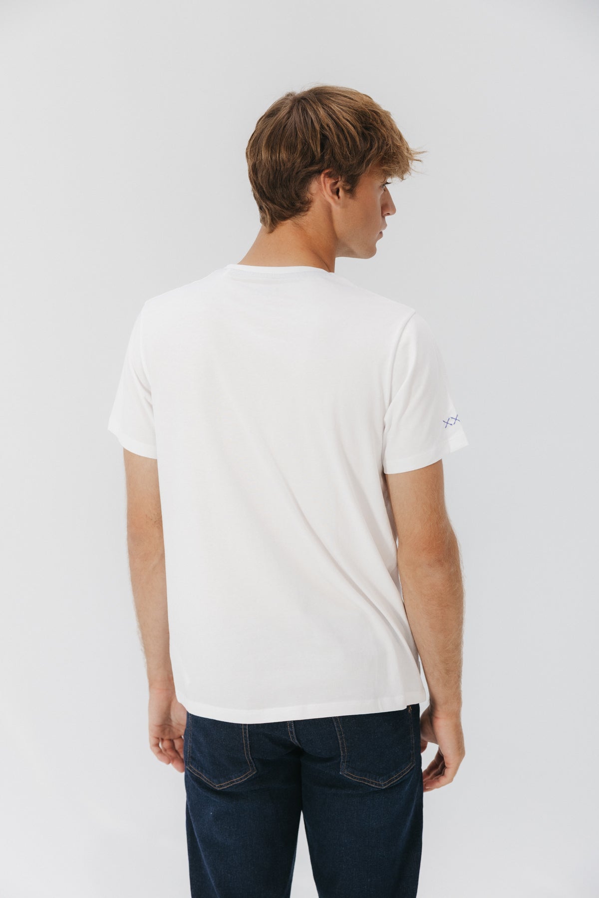 T-SHIRT COM O TRAJE DO POLO NORTE BRANCO PURO