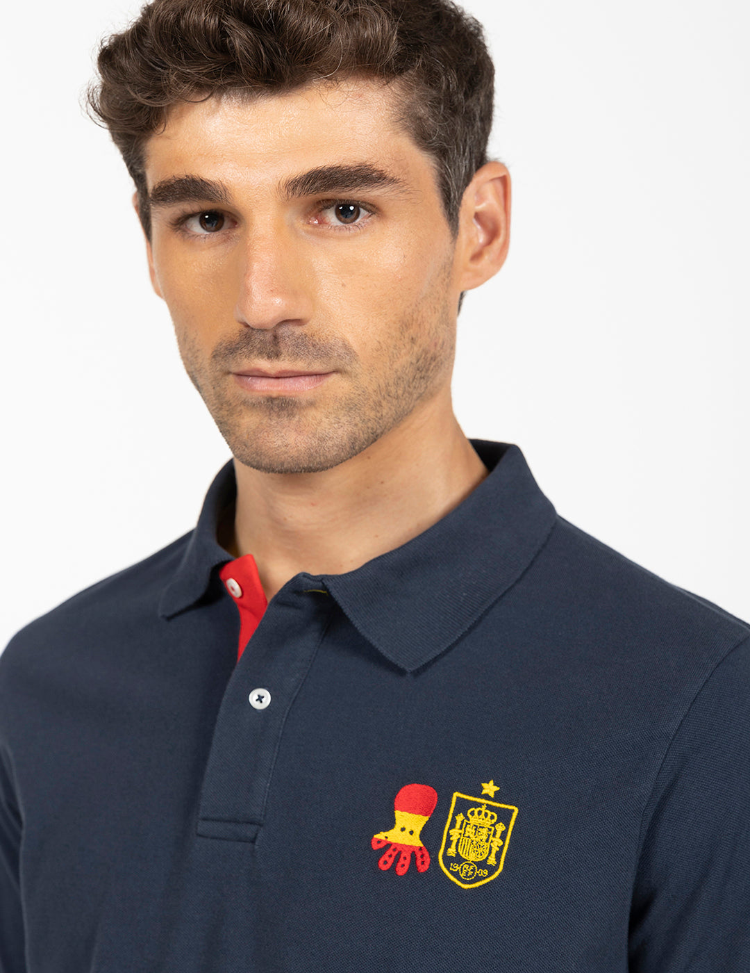 POLO ESCUDO RFEF MARINO DELAVÉ