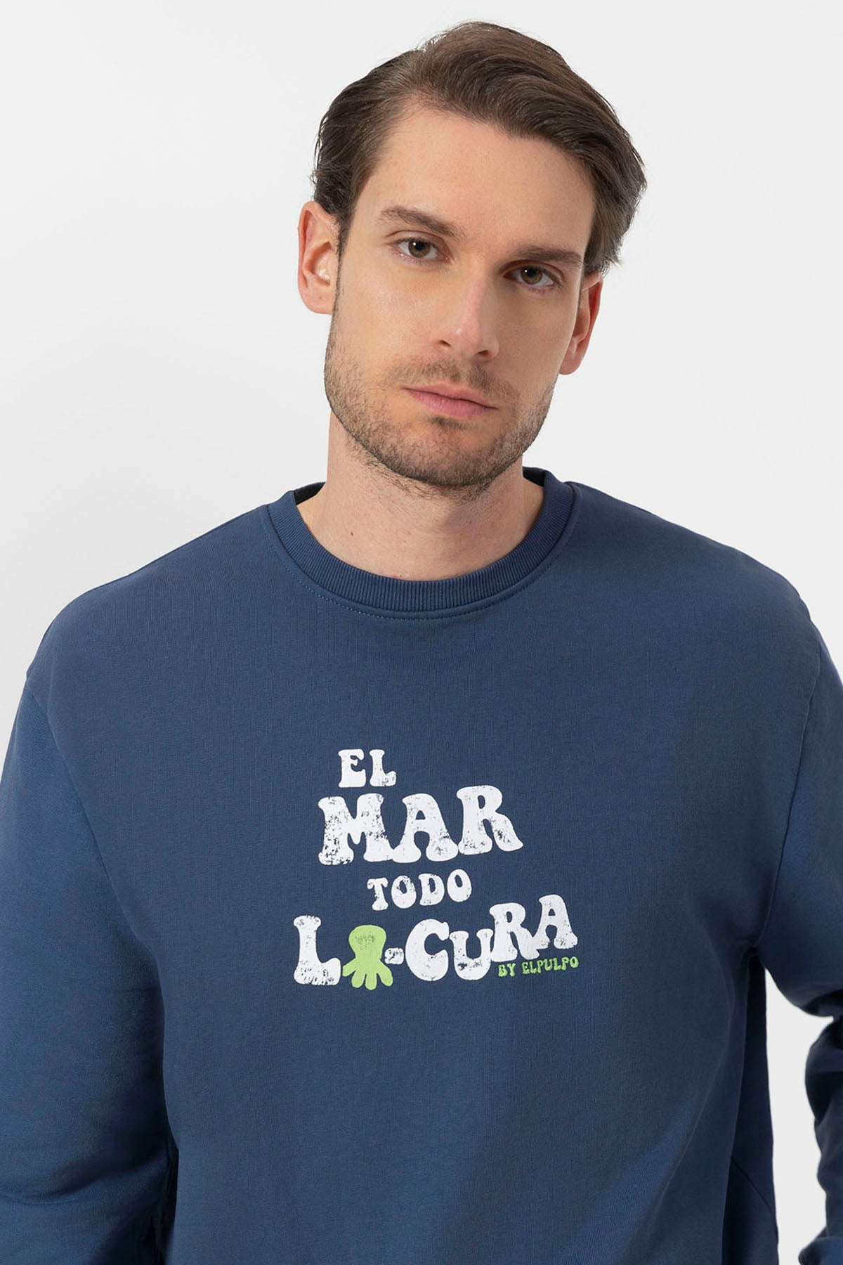SUDADERA EL MAR TODO LO-CURA DESGASTADO AZUL MARINO DELAVÉ