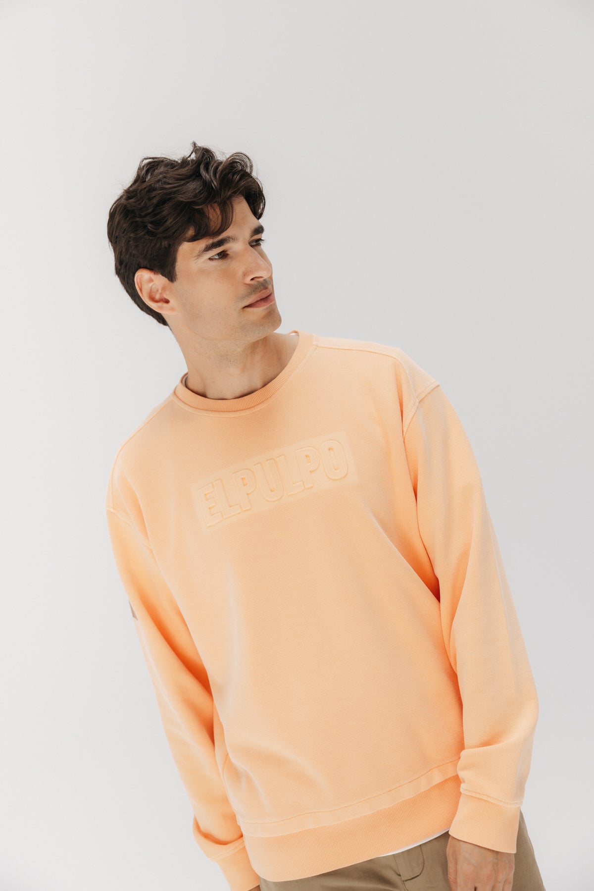SUDADERA LAVADA ESTAMPADO RELIEVE HELSINKI MELOCOTÓN