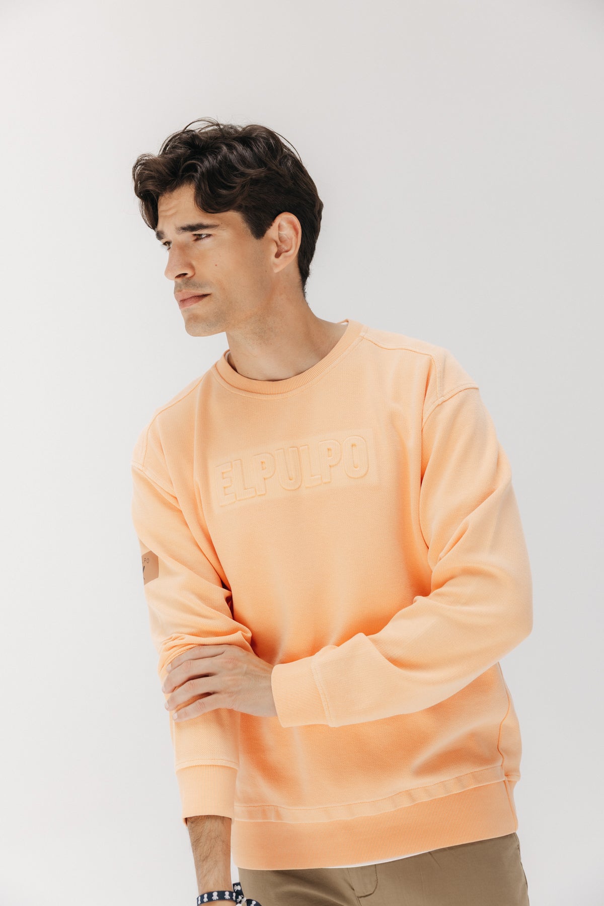 SUDADERA LAVADA ESTAMPADO RELIEVE HELSINKI MELOCOTÓN