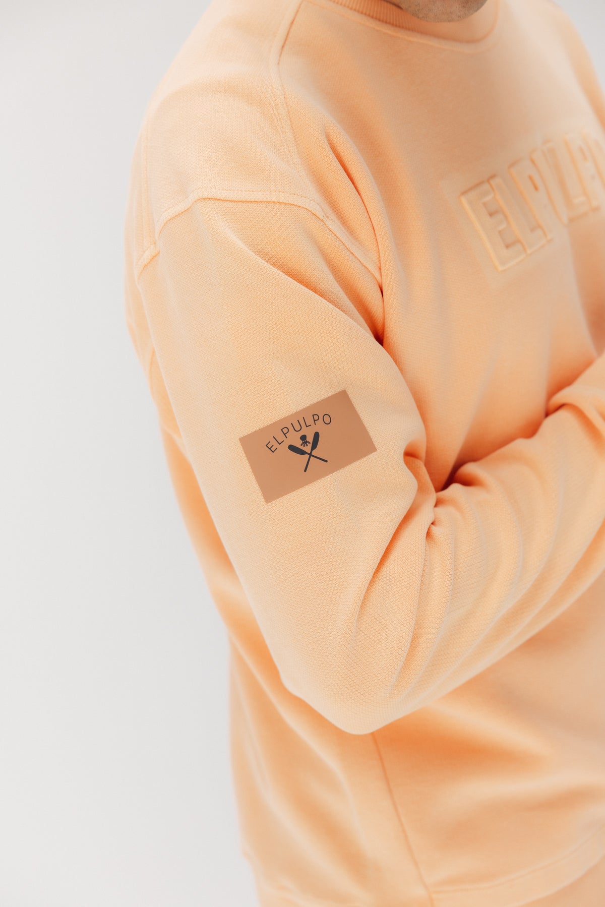 SUDADERA LAVADA ESTAMPADO RELIEVE HELSINKI MELOCOTÓN