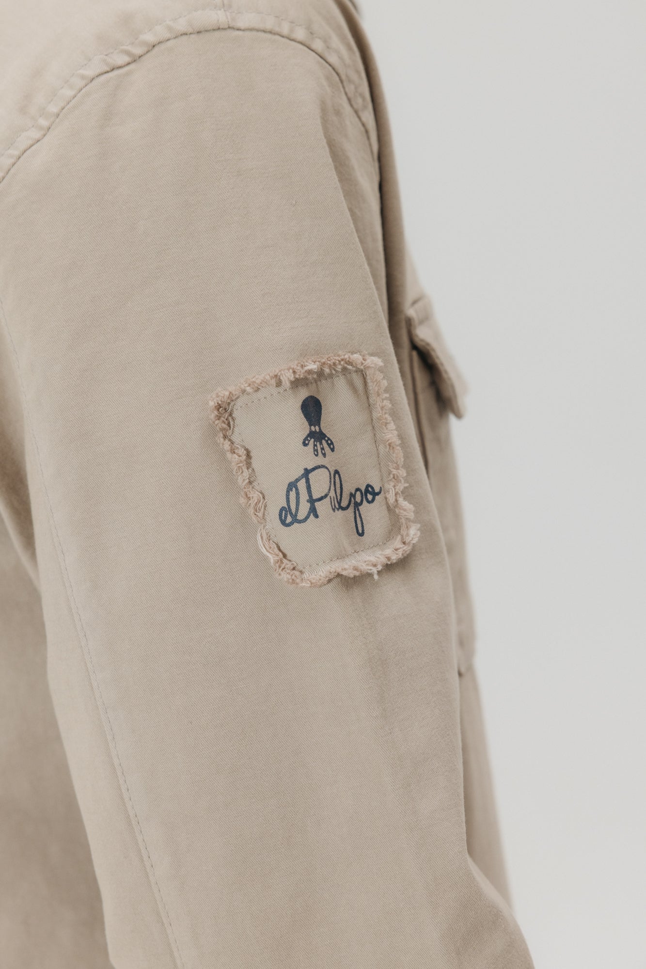 SOBRECAMISA HERITAGE DOS BOLSILLOS ARENA