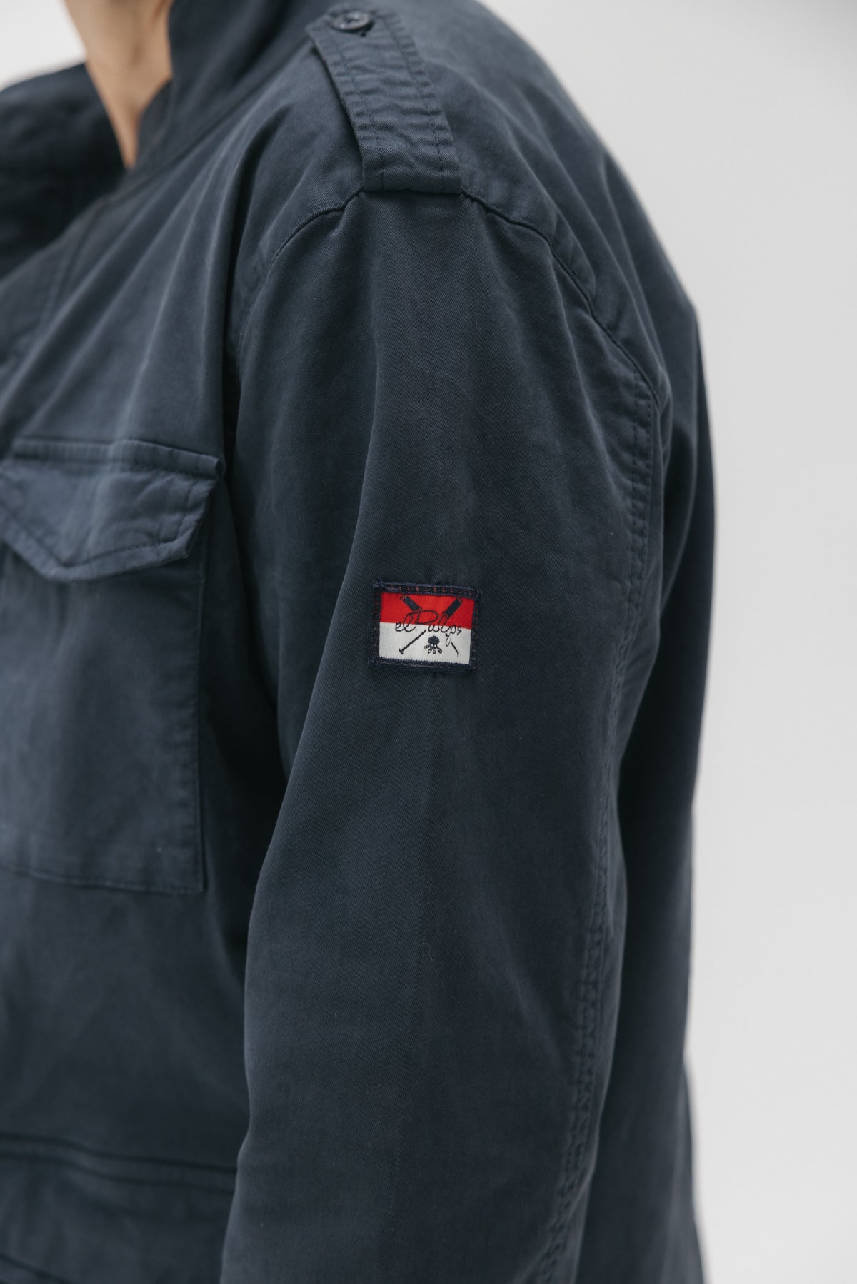 Field jacket garment dyed azul marino