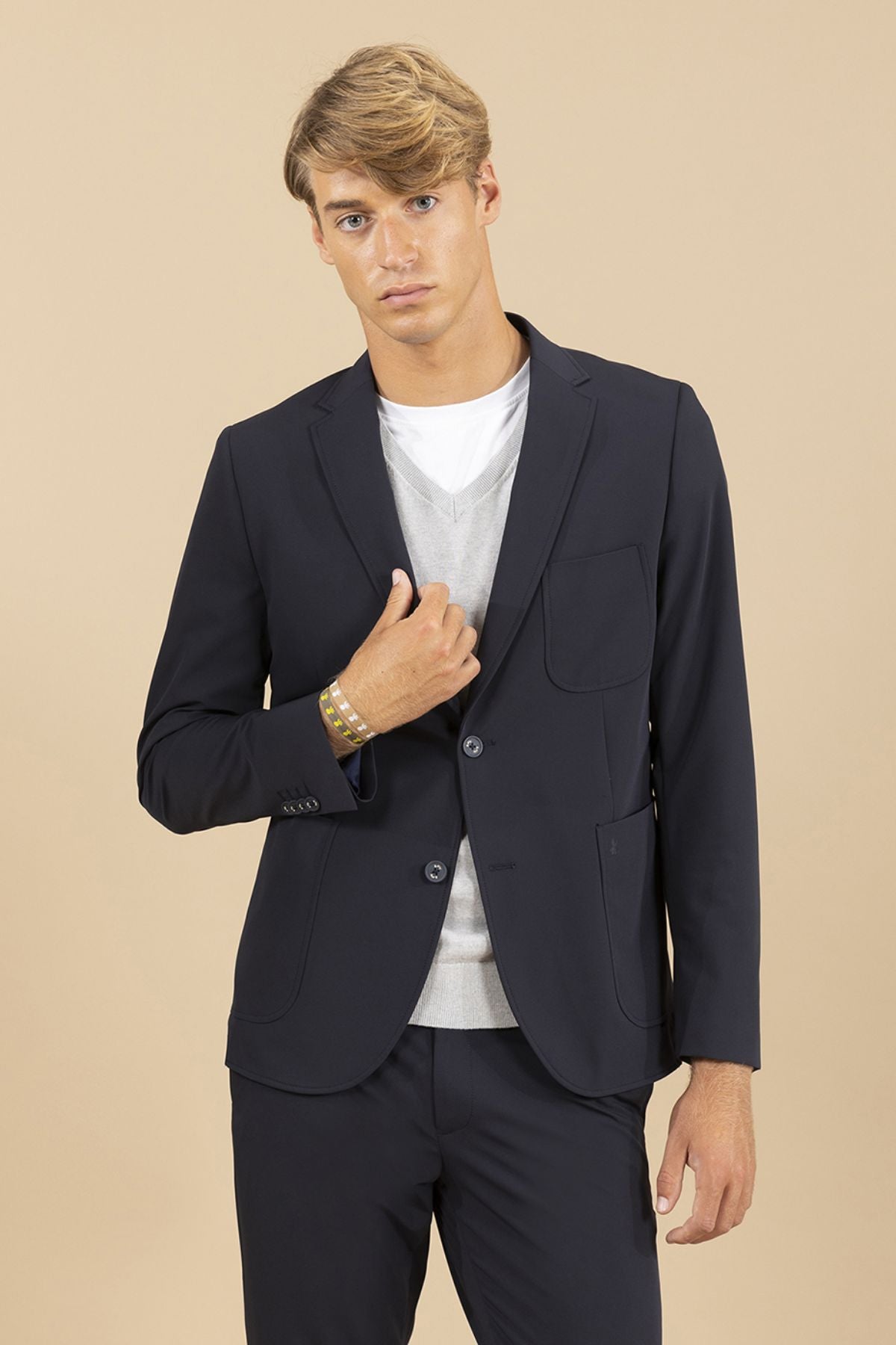 AMERICANA ULTRALIGERA BOLSILLOS PARCHE AZUL MARINO