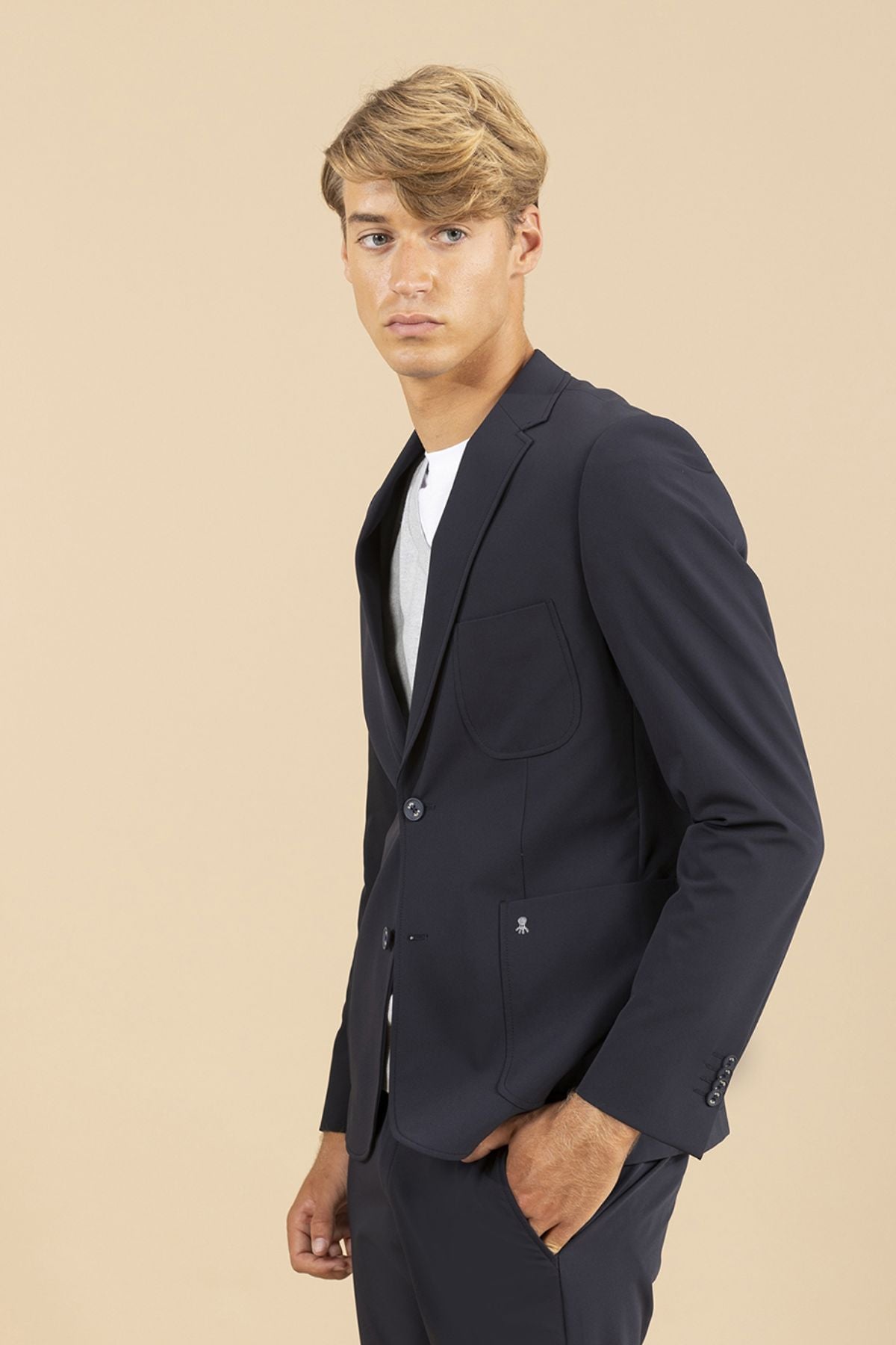 AMERICANA ULTRALIGERA BOLSILLOS PARCHE AZUL MARINO