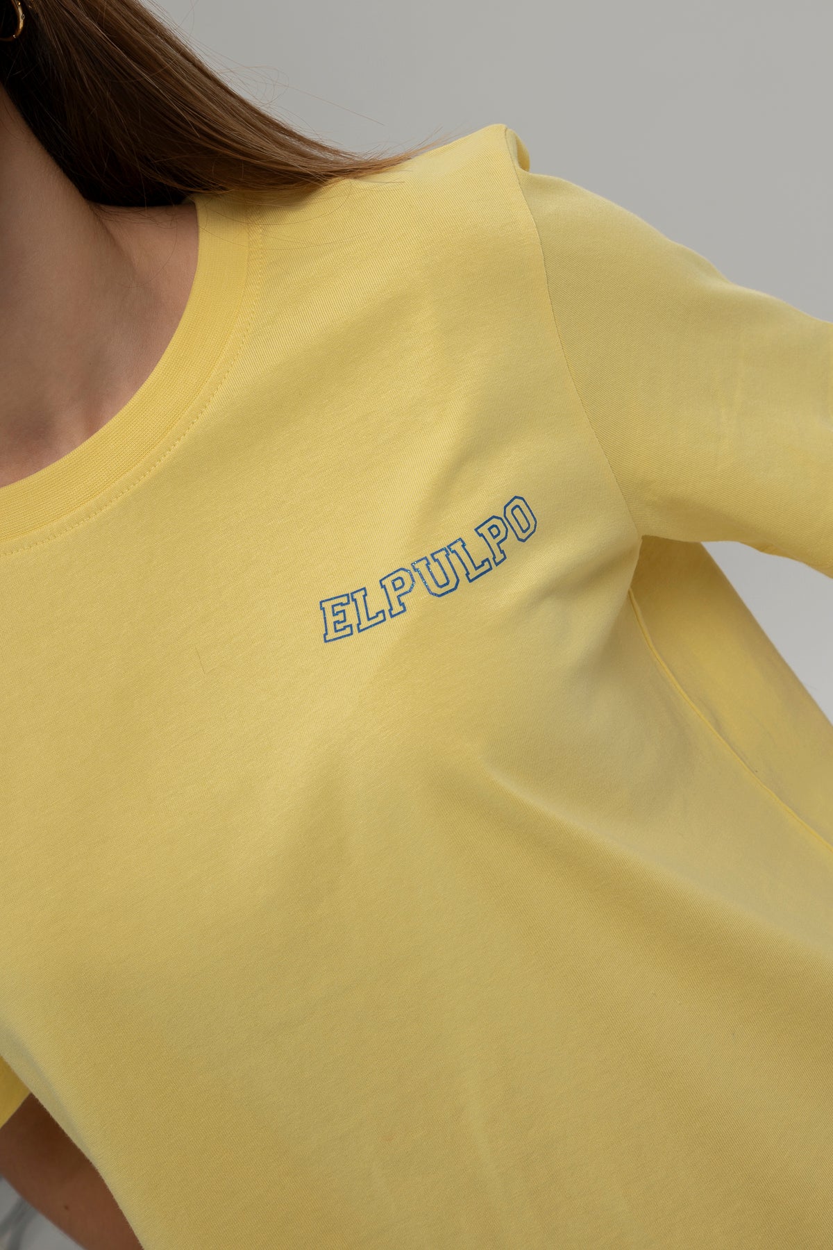 Camiseta teen manga corta alas amarillo claro