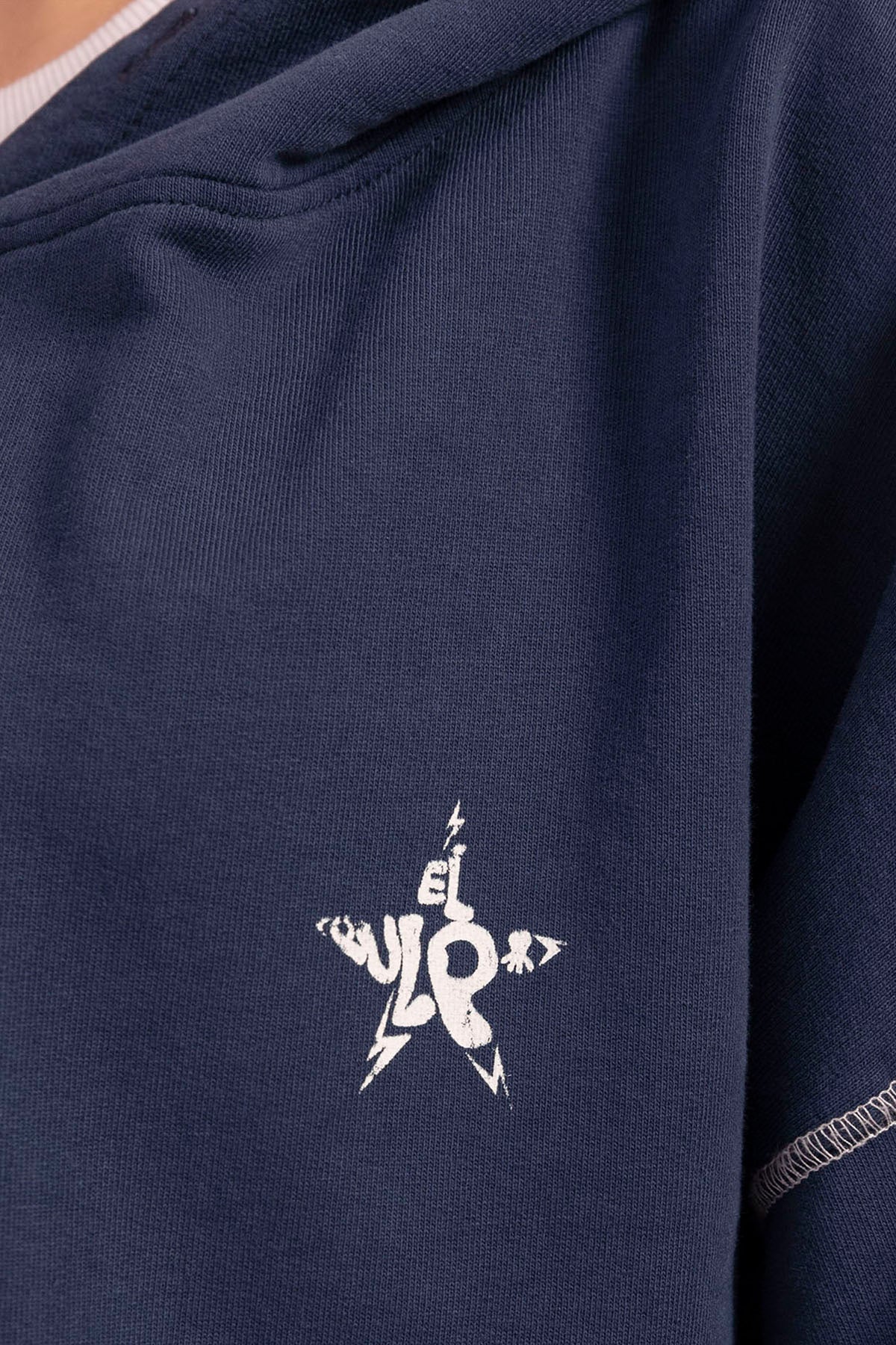 SUDADERA TEEN CON CAPUCHA LAVADA SEA YOU SOON AZUL MARINO DELAVÉ