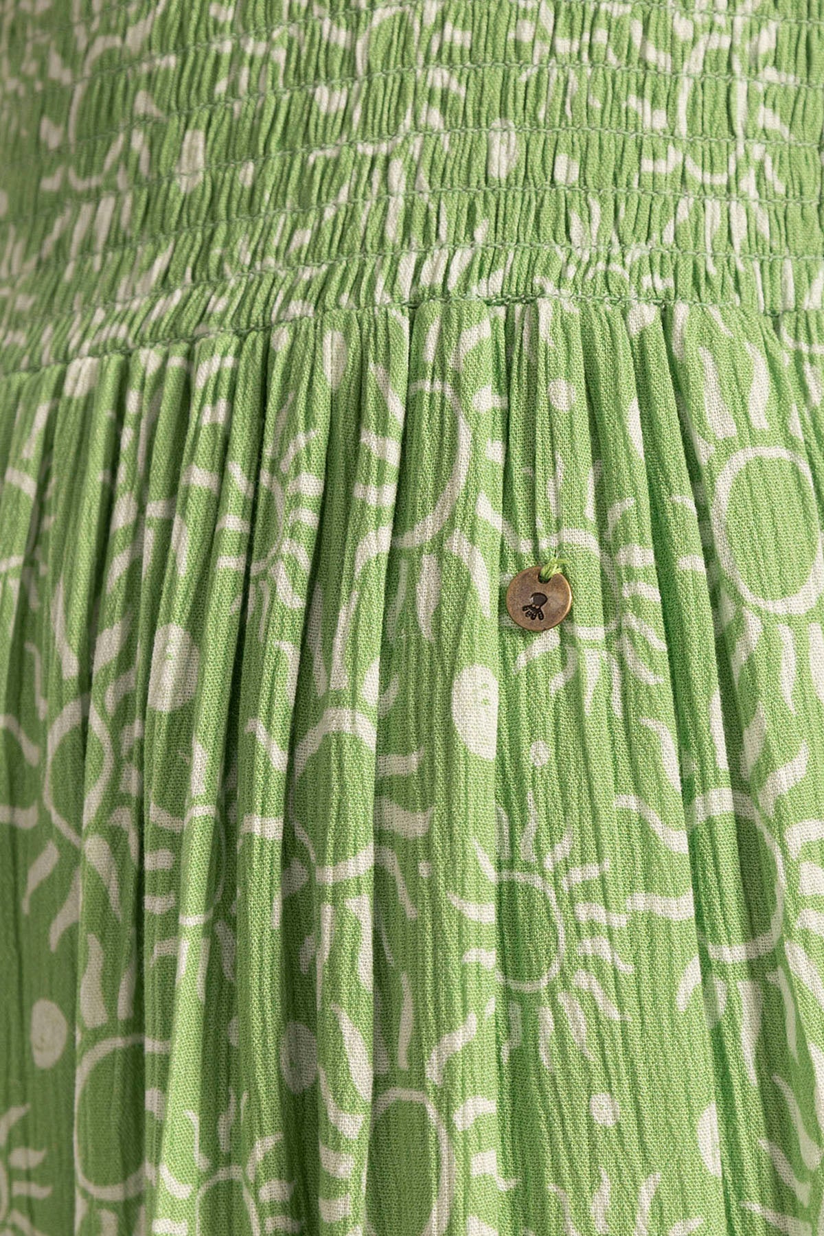 TEEN LONG DRESS WITH WIDE STRAP AND LIGHT GREEN SUNS PRINT