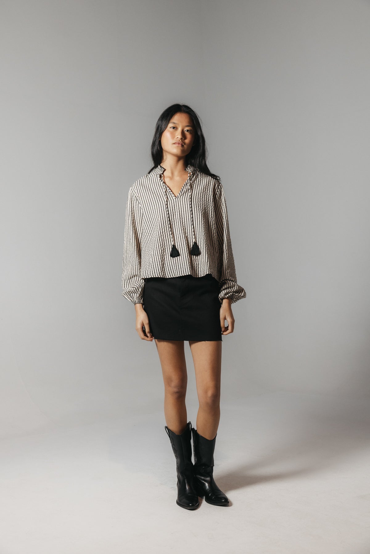 FALDA TEEN DETALLE TACHAS NEGRO