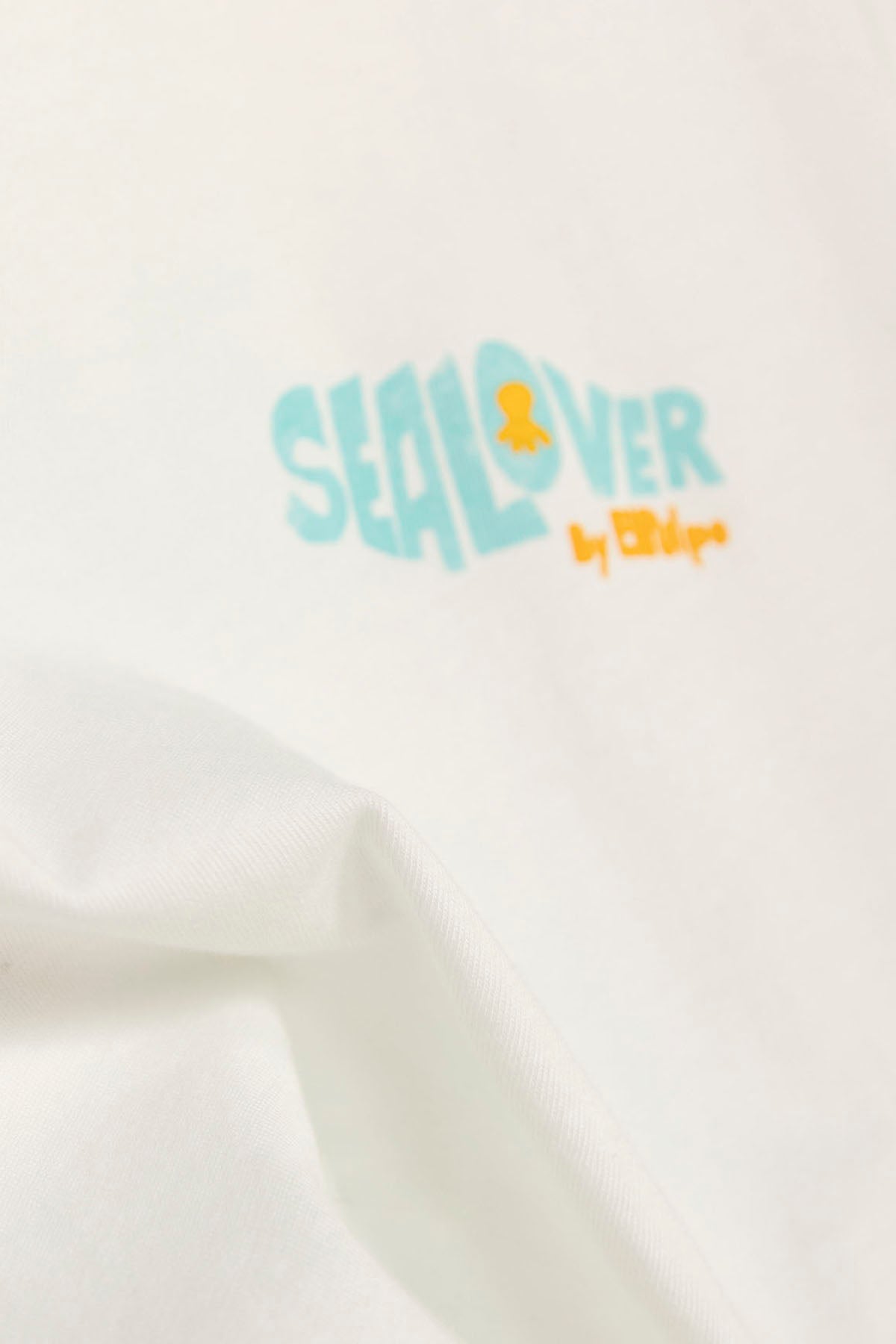 CAMISETA NIÑO OVERSIZE SURFING LIKE SEALOVER BLANCO PURO