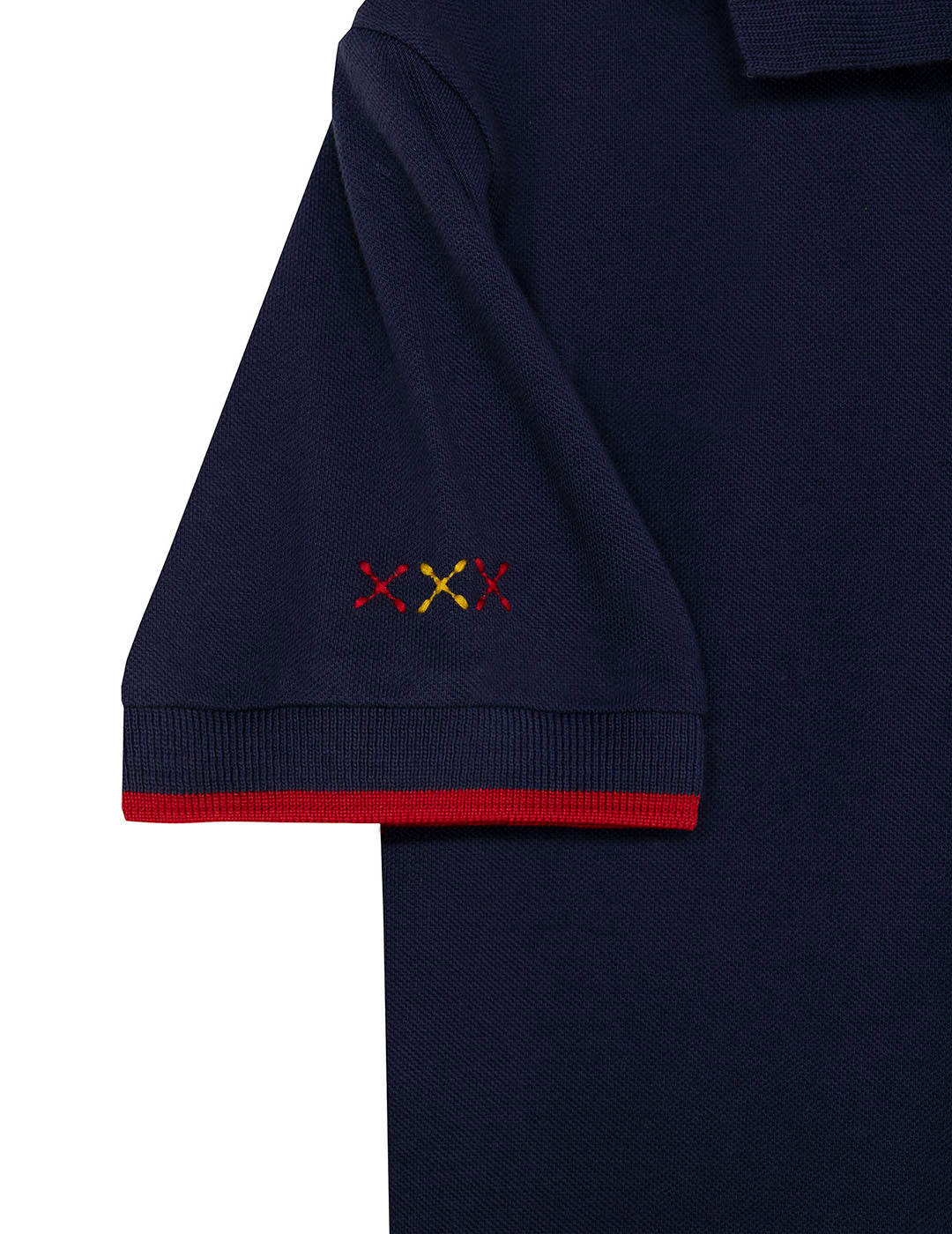 CAMISOLA POLO MENINA COM ESTAMPA DE POLVO E LARANJA COM CONTRASTES AZUL MARINHO