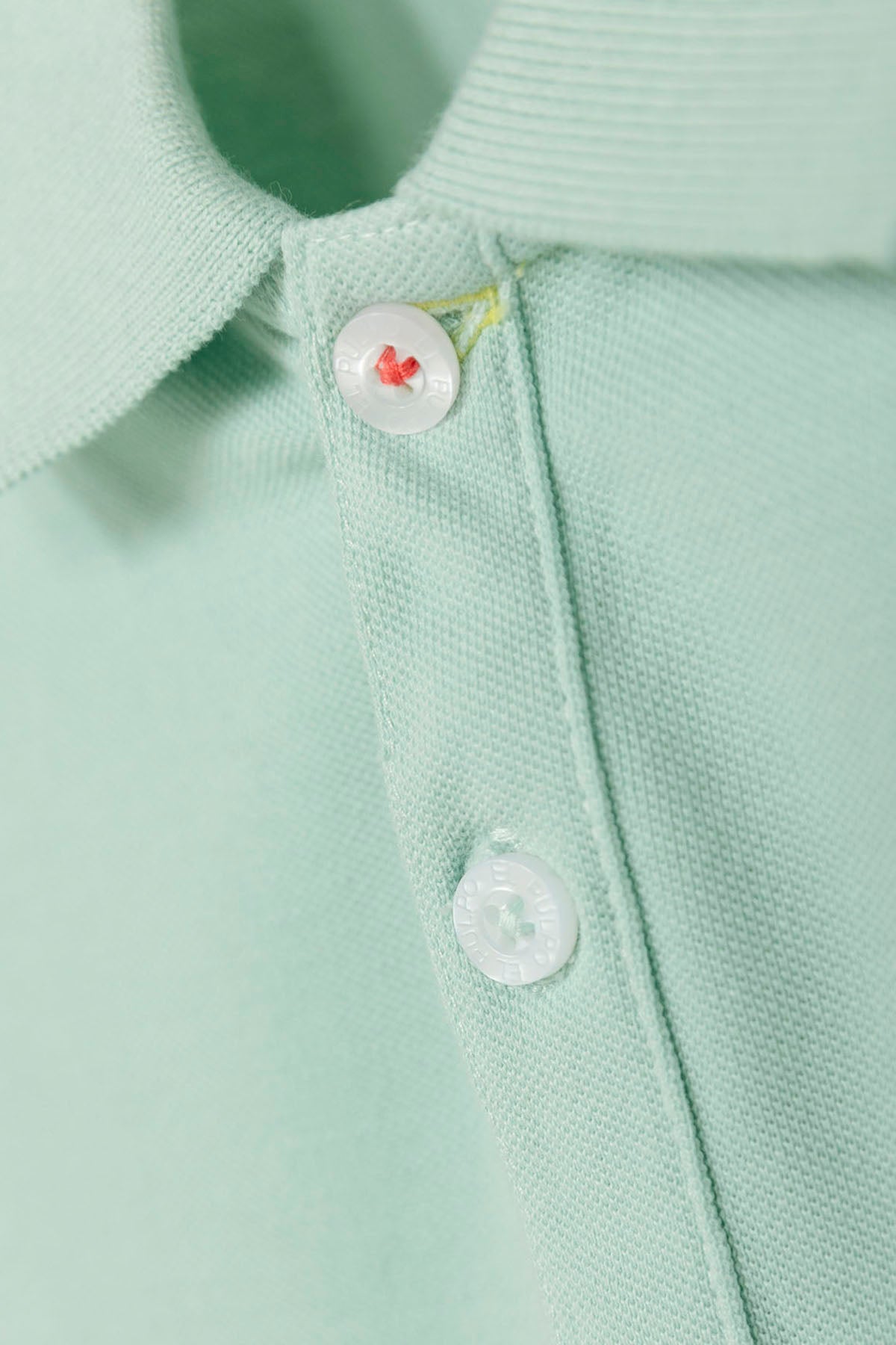 BOYS' WASHED POLO WITH CONTRASTING EMBROIDERY IN TURQUOISE BLUE