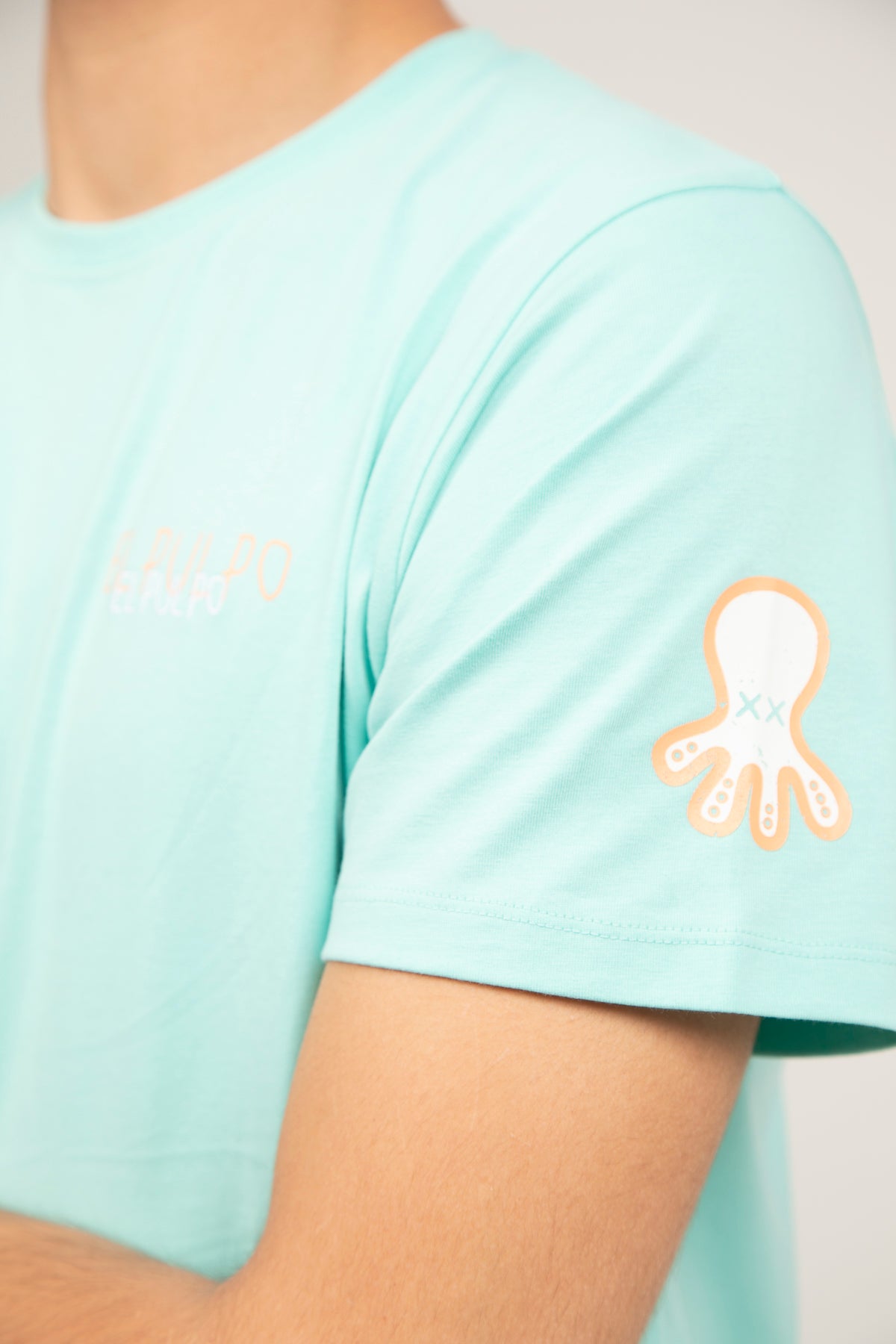 Camiseta logo multiposición verde agua