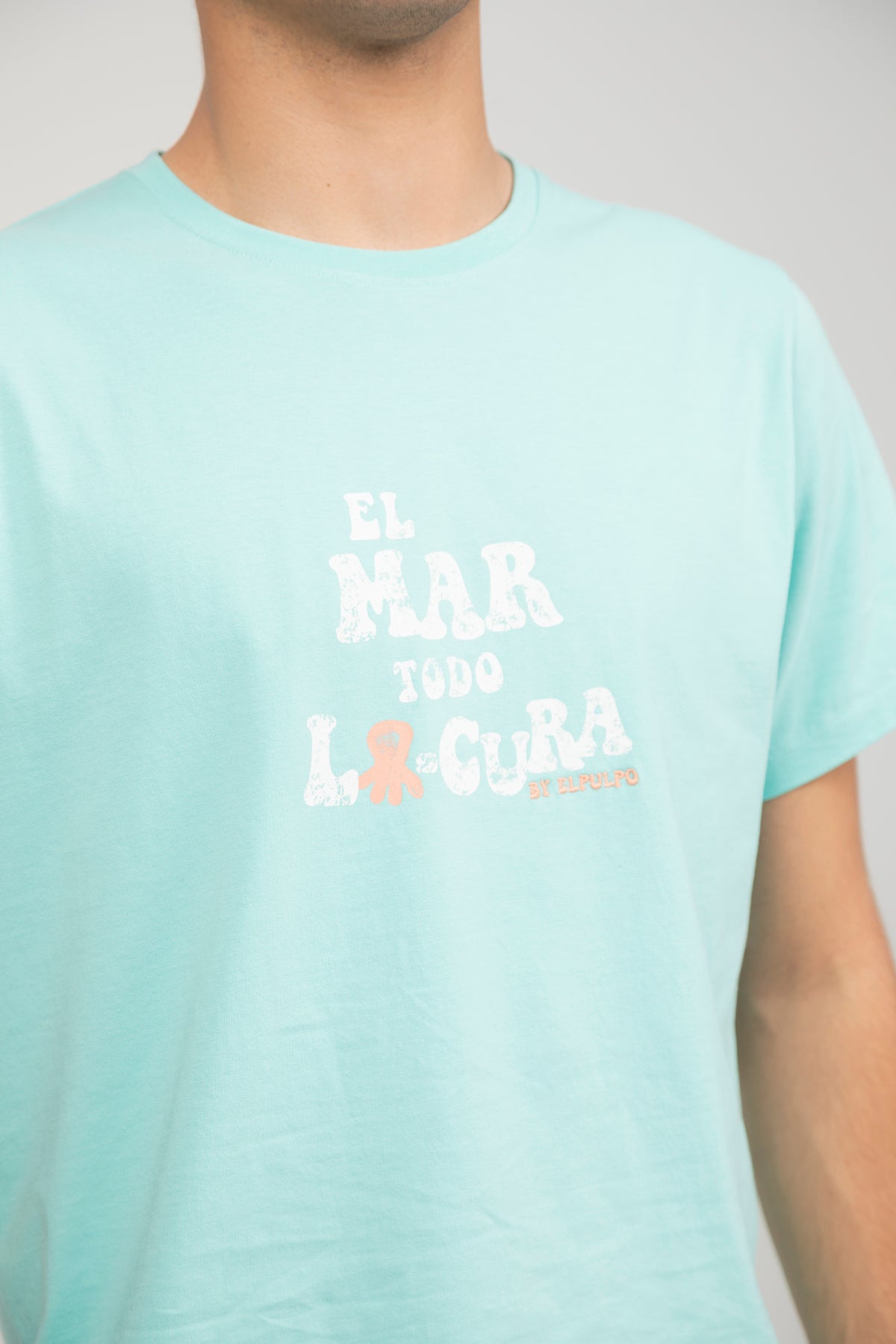 Camiseta mensaje el mar todo locura verde agua