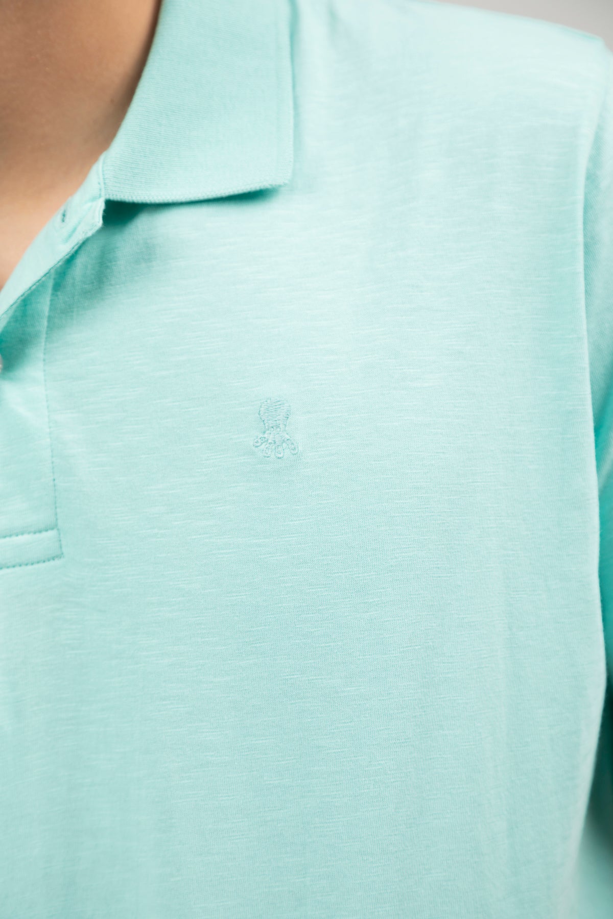 Polo cotton slub logo a tono verde agua