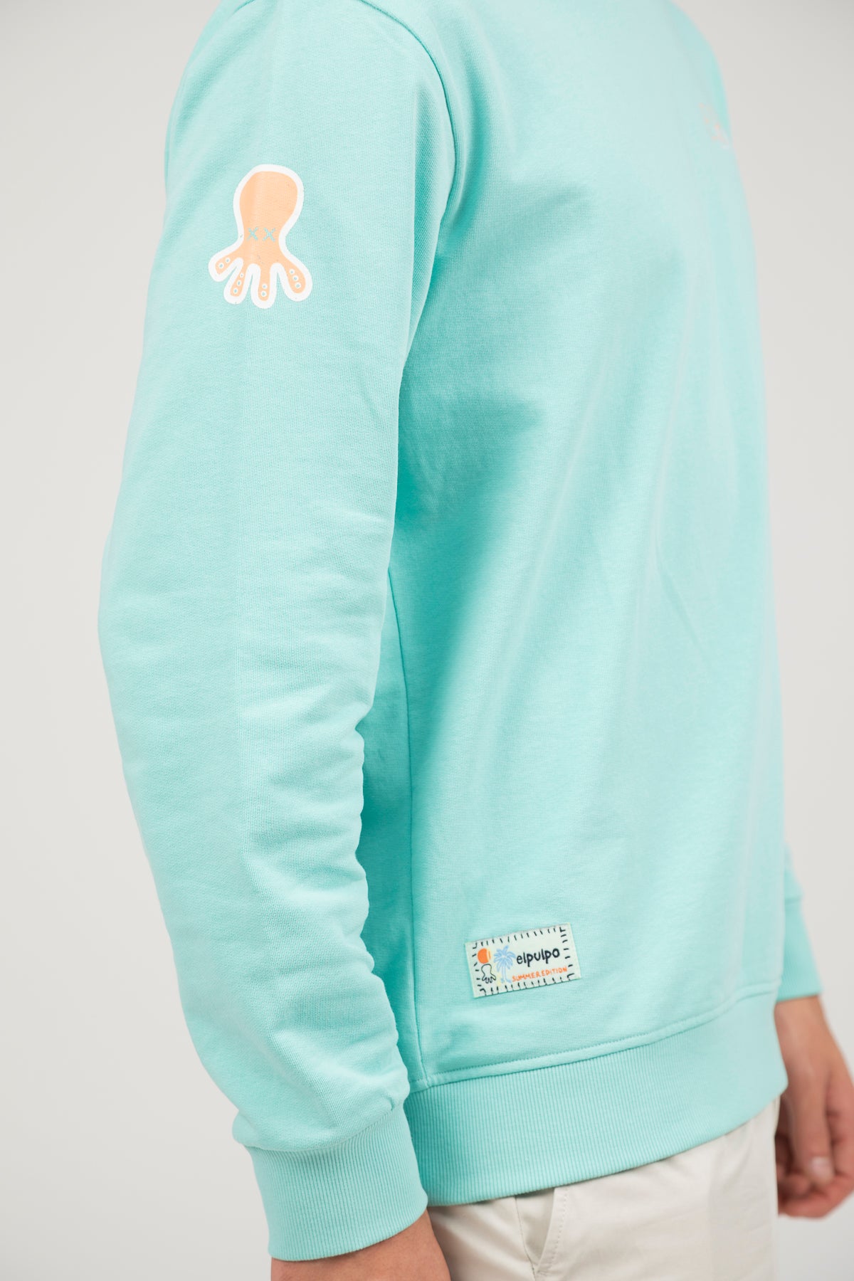 Sudadera logo multiposición verde agua