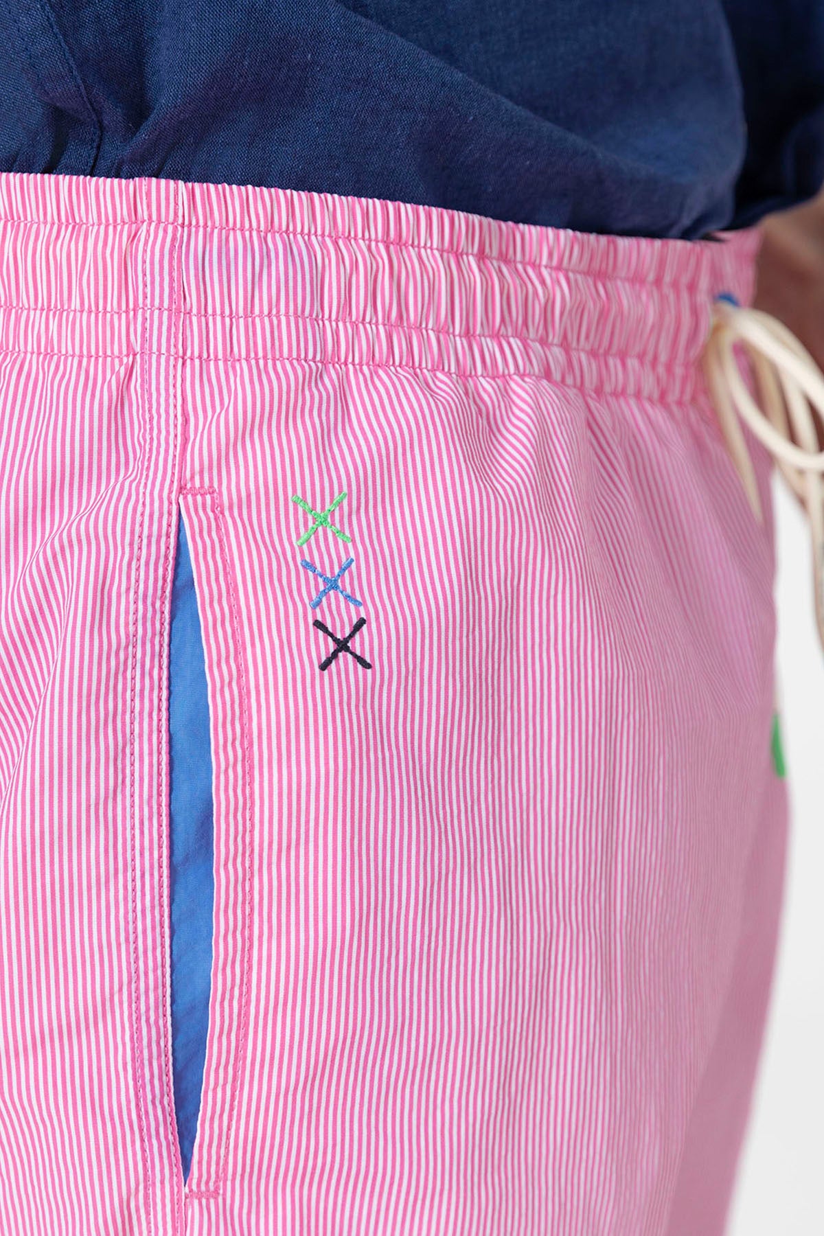 MICROTRIPE SWIMSUIT WITH CONTRASTING EMBROIDERED LOGO IN GUM PINK