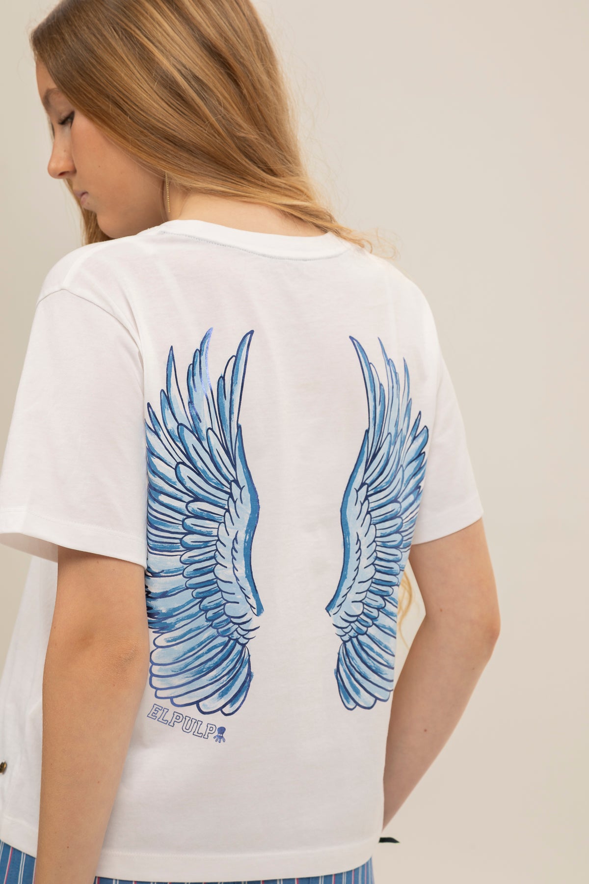 CAMISETA TEEN LAVADA ALAS AZUL MARINO
