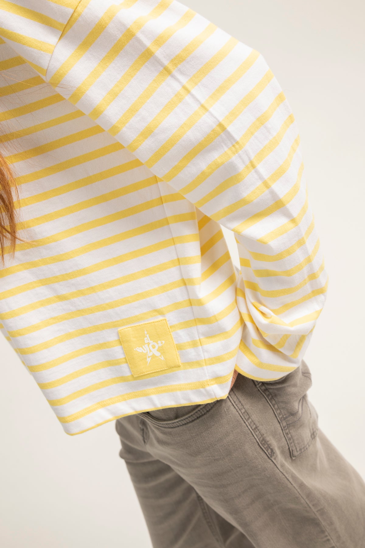 Camiseta teen manga larga amarillo claro