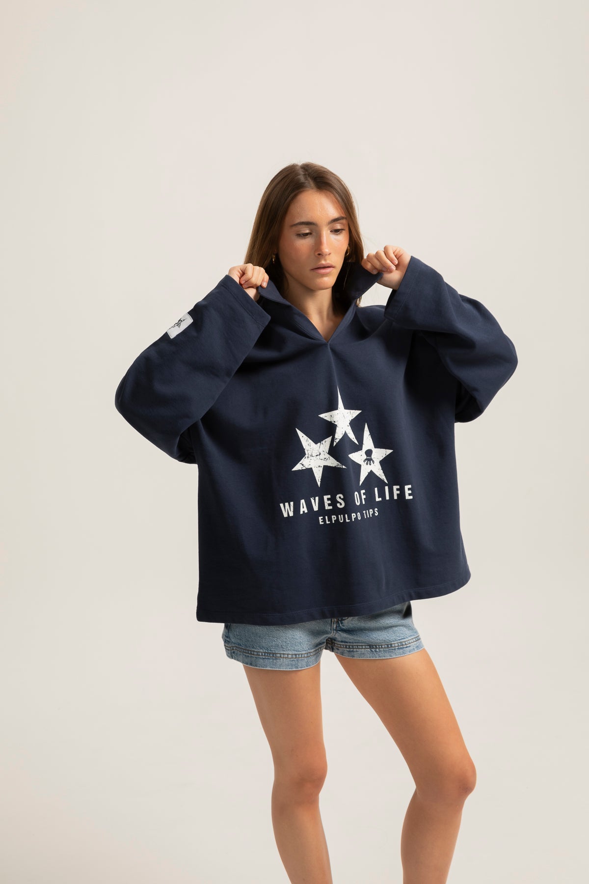 Polo teen manga larga estampado estrellas azul marino