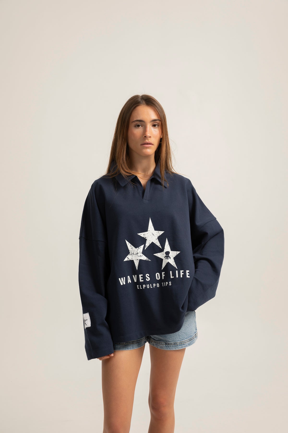 Polo teen manga larga estampado estrellas azul marino
