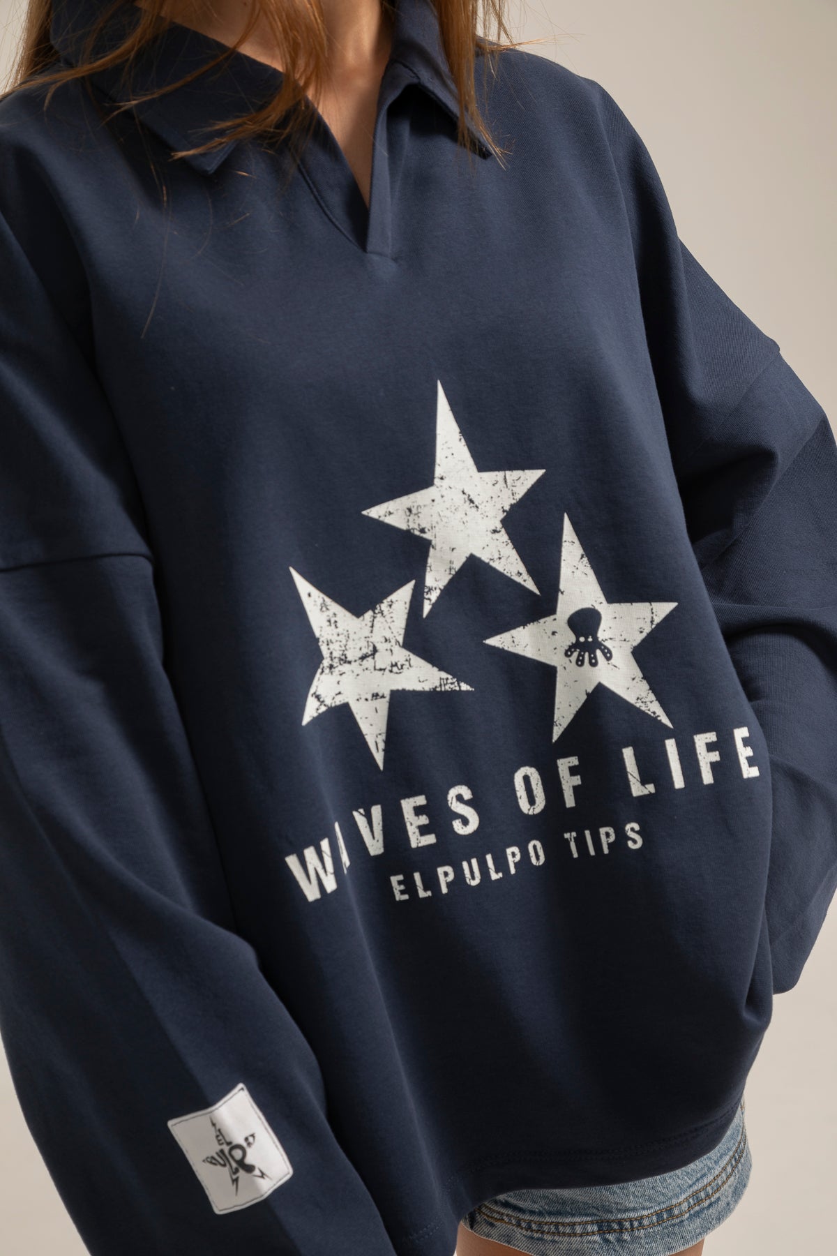 Polo teen manga larga estampado estrellas azul marino