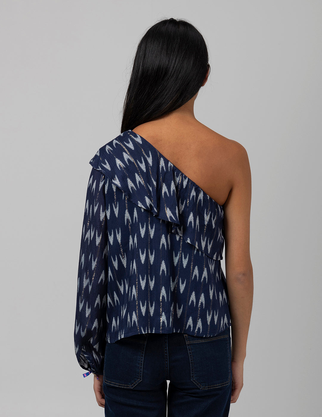 BLUSA TEEN ASIMÉTRICA ESTAMPADO FLECHAS LUREX AZUL MARINO