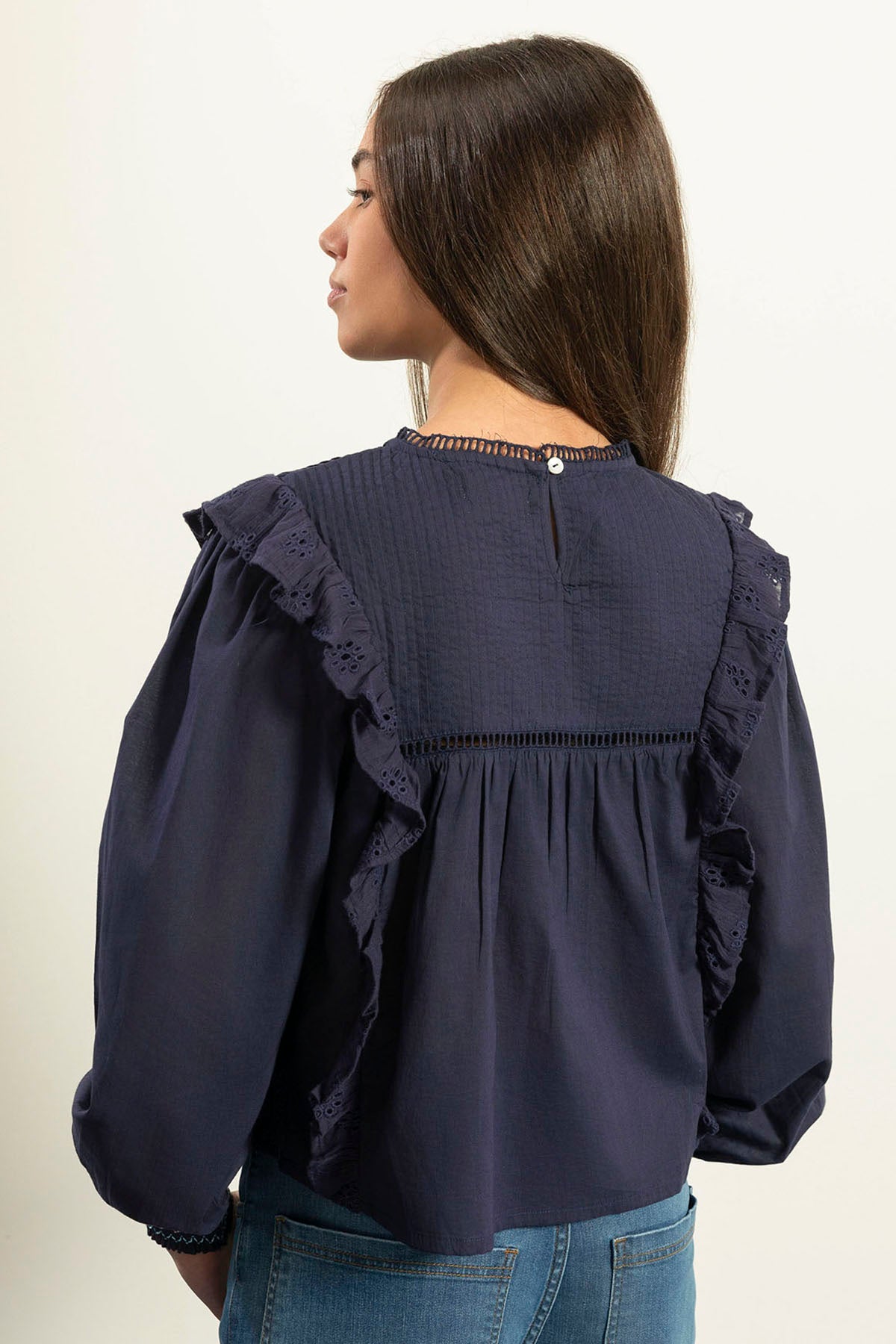 TEEN BLOUSE WITH PLEATS AND RUFFLES IN NAVY BLUE