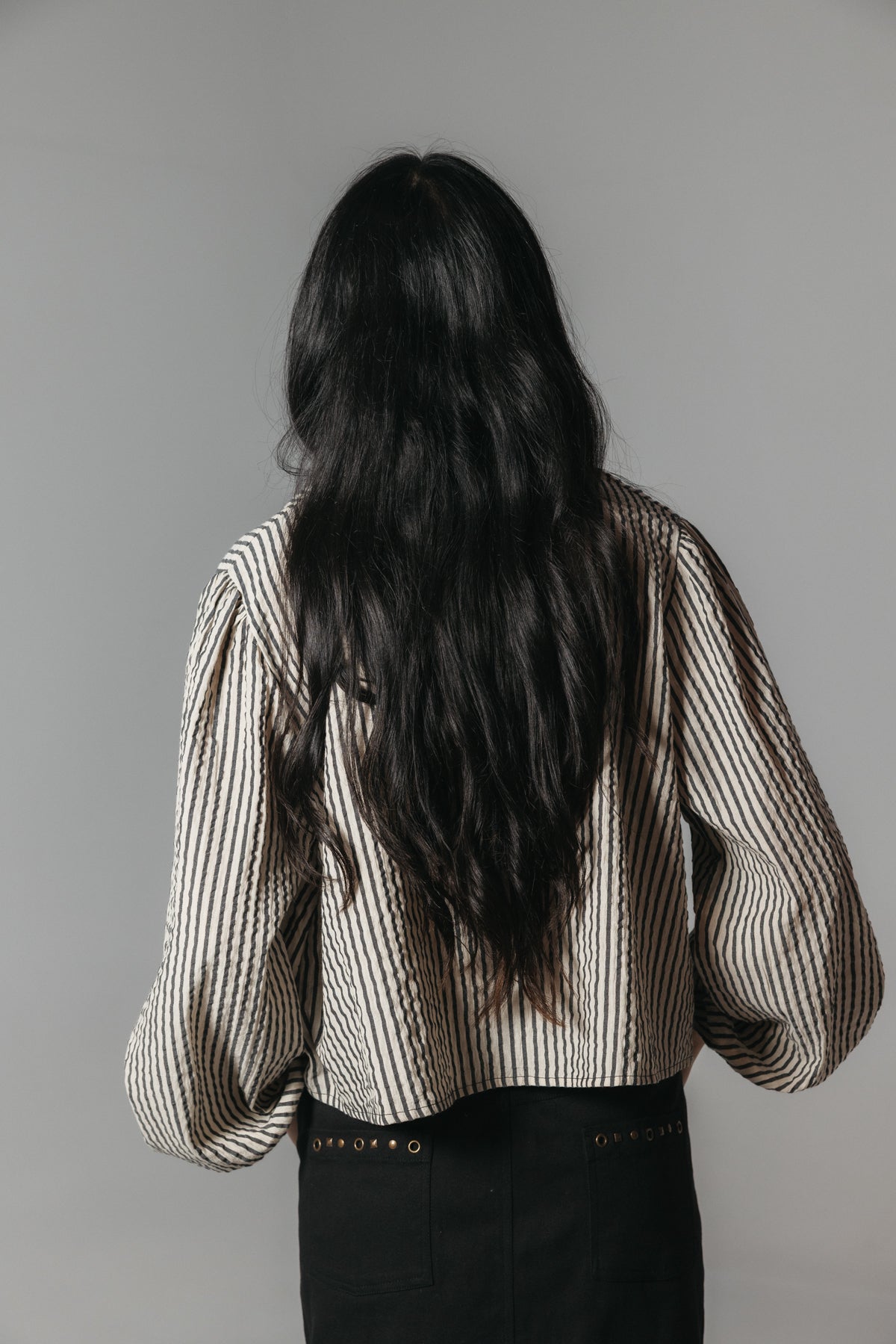 FALDA TEEN DETALLE TACHAS NEGRO