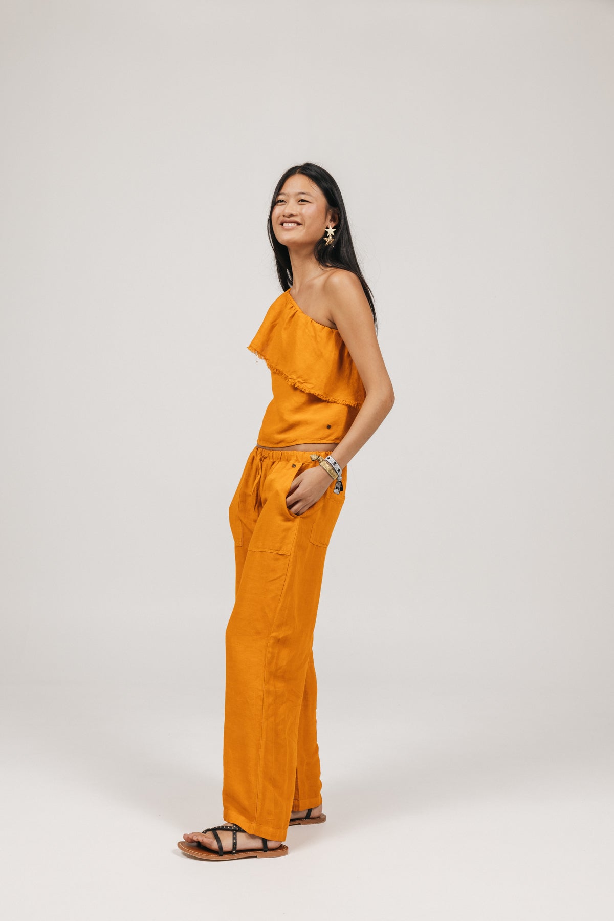 PANTALÓN TEEN FLUIDO BOLSILLOS LATERALES NARANJA DELAVÉ