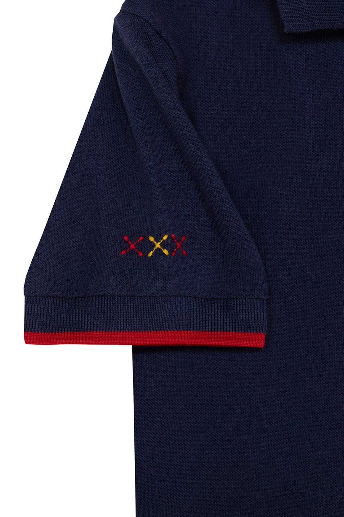 POLO NIÑO ESTAMPADO ELPULPO Y NARANJITO CONTRASTES AZUL MARINO