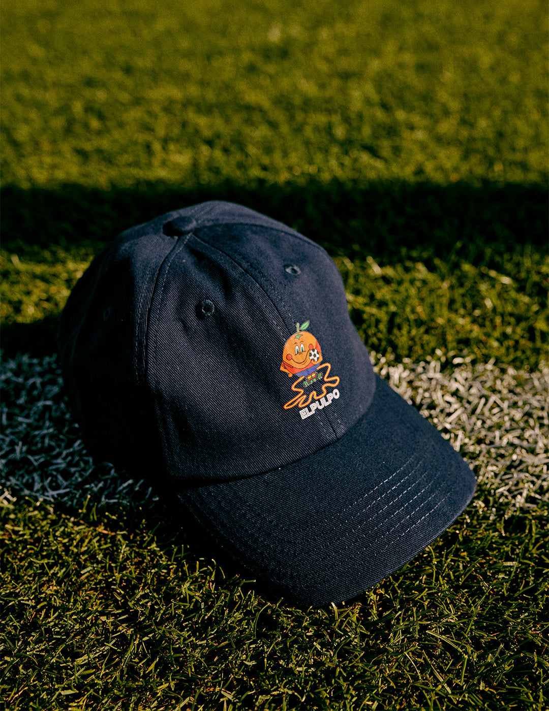 DELAVÉ WASHED CAP WITH OCTOPUS AND NAVY BLUE ORANGE PRINT