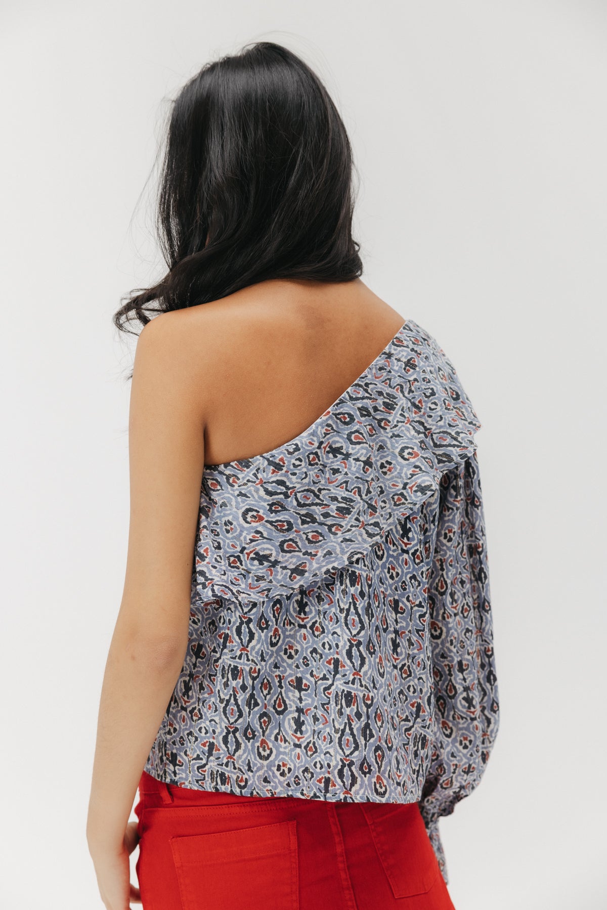 BLUSA TEEN ASIMÉTRICA ESTAMPADO GEOMÉTRICO MULTICOLOR