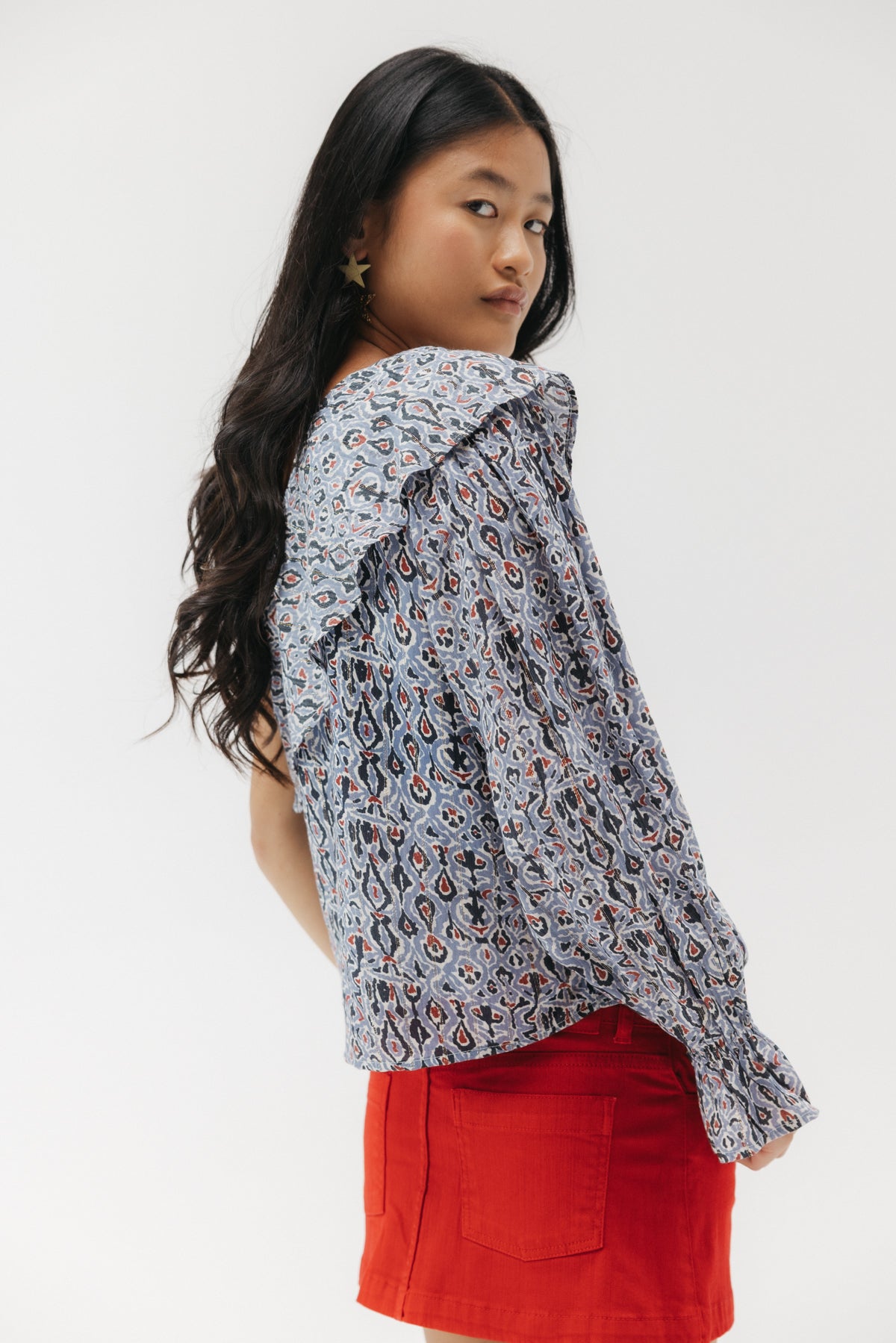 BLUSA TEEN ASIMÉTRICA ESTAMPADO GEOMÉTRICO MULTICOLOR