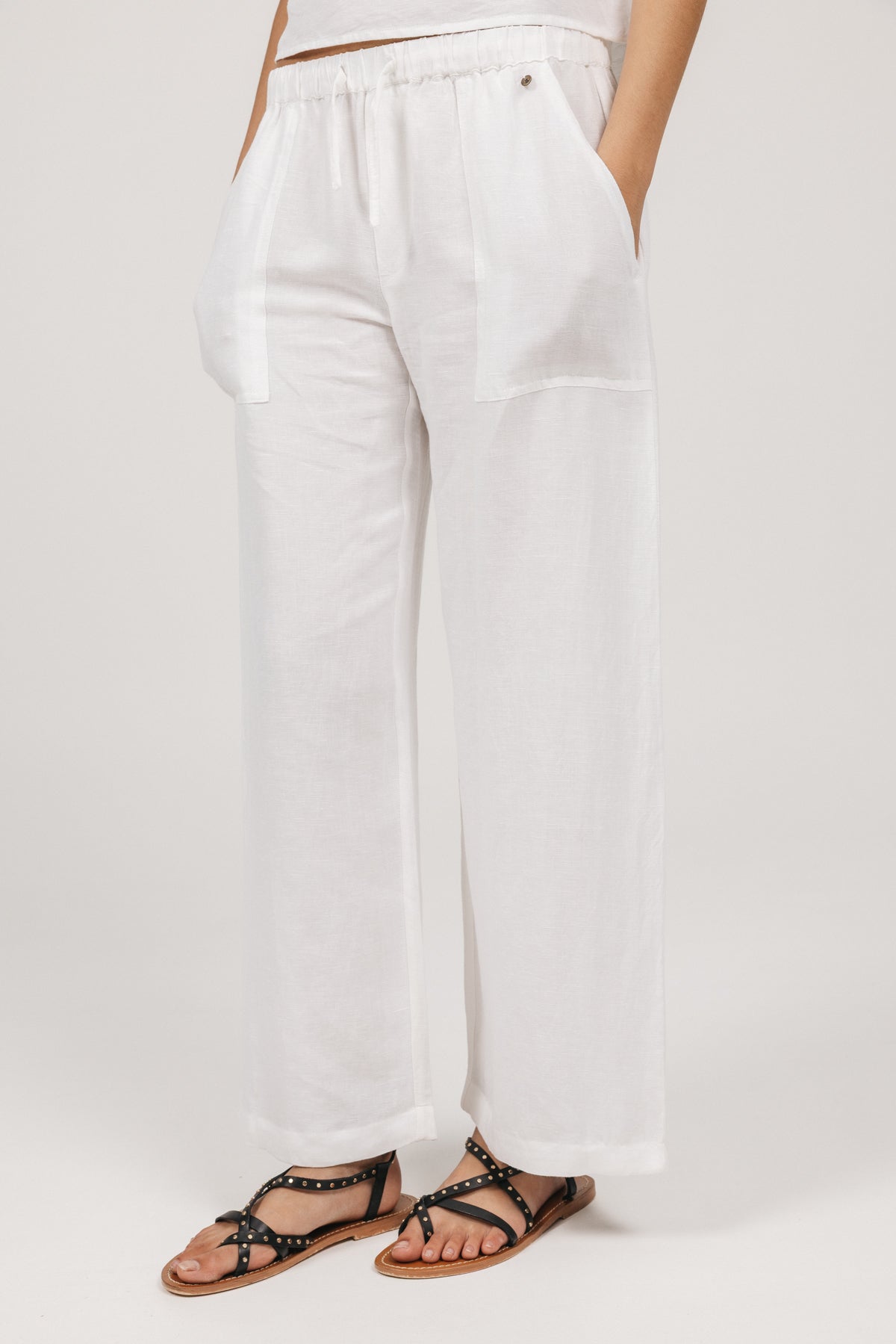 PANTALÓN TEEN FLUIDO BOLSILLOS LATERALES BLANCO PURO