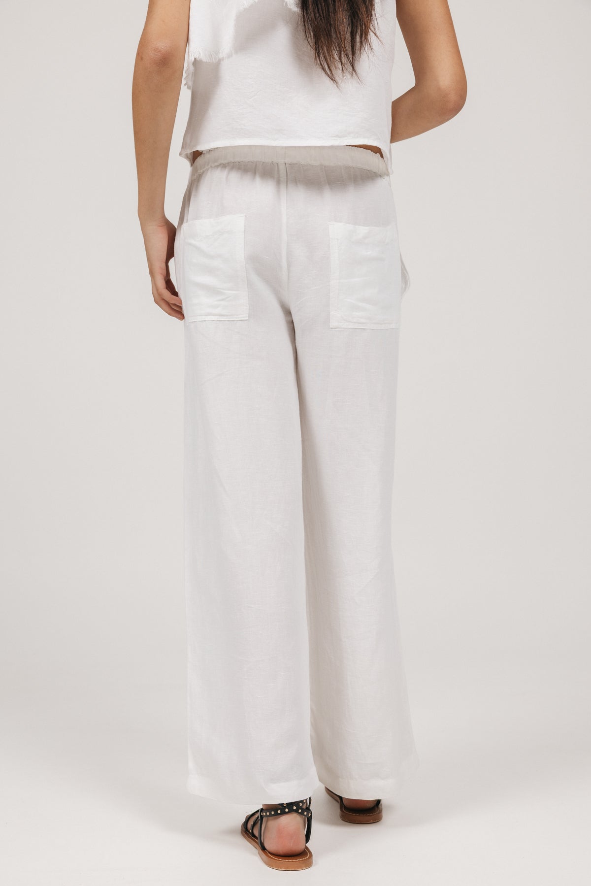 PANTALÓN TEEN FLUIDO BOLSILLOS LATERALES BLANCO PURO