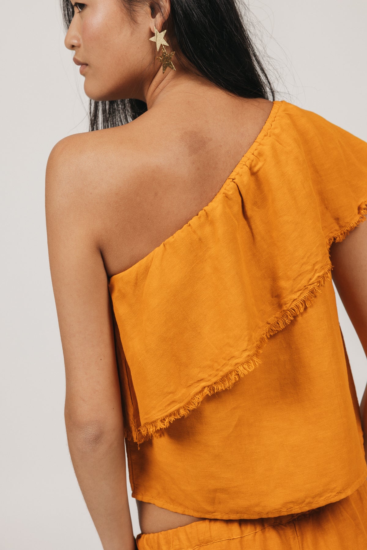 DELAVÉ ORANGE FRAYED RUFFLE TEEN TOP